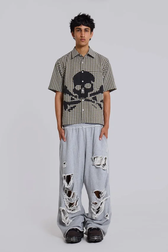 Abgenutzte graue melierte, weite Monster Joggers