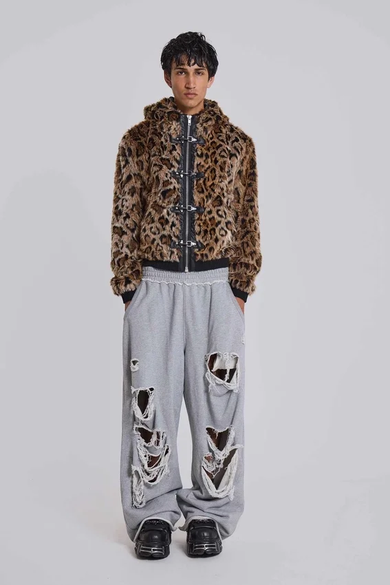 Abgenutzte graue melierte, weite Monster Joggers