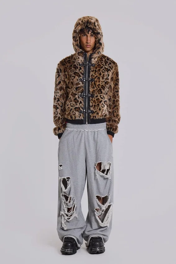 Abgenutzte graue melierte, weite Monster Joggers