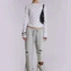 Cleo Jogginghose mit Bootcut-Schnitt und Used-Look