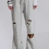 Cleo Jogginghose mit Bootcut-Schnitt und Used-Look
