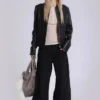 Einfarbige schwarze Colossus Jeans