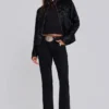 Einfarbige schwarze Thirteen-Jeans