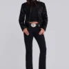 Einfarbige schwarze Thirteen-Jeans