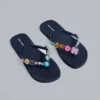 Flip-Flops mit Schmuckanhänger