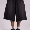 Gewaschene schwarze „Monster“ Jogger-Baggy-Shorts
