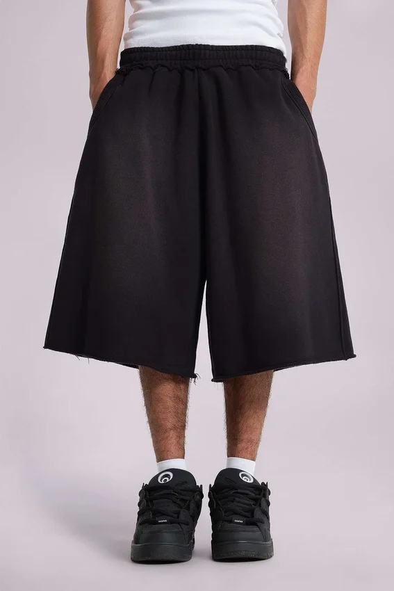 Gewaschene schwarze „Monster“ Jogger-Baggy-Shorts
