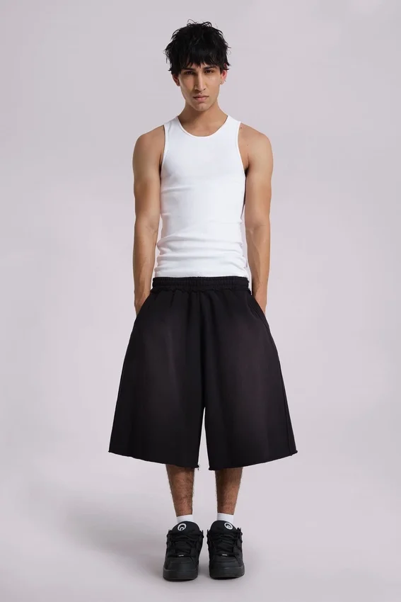 Gewaschene schwarze „Monster“ Jogger-Baggy-Shorts