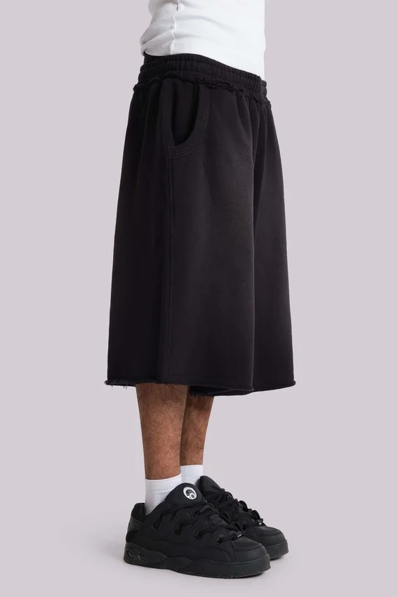 Gewaschene schwarze „Monster“ Jogger-Baggy-Shorts