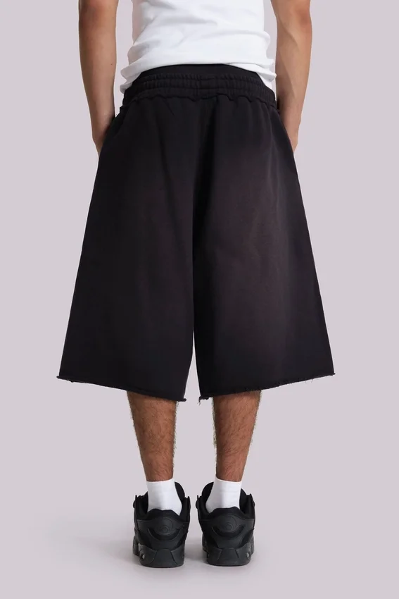 Gewaschene schwarze „Monster“ Jogger-Baggy-Shorts