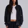 Gewaschener schwarzer Hoodie mit Reißverschluss, Waffelpiqué-Futter und sonnenverblasster Optik