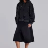 Gewaschener schwarzer Hoodie mit Reißverschluss, Waffelpiqué-Futter und sonnenverblasster Optik