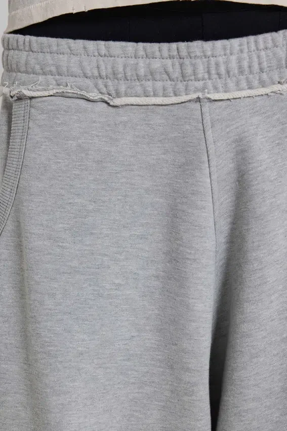 Grau melierte, baggy Monster Joggers mit Umschlag