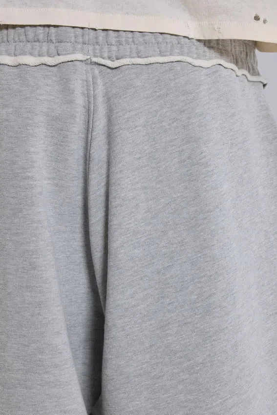 Grau melierte, baggy Monster Joggers mit Umschlag