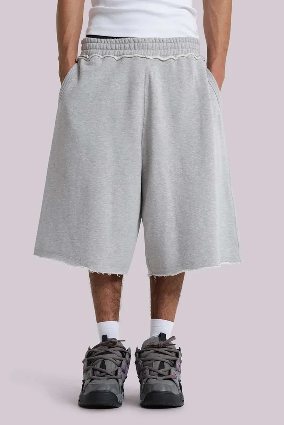 Grau melierte „Monster Joggers“ Baggy-Shorts