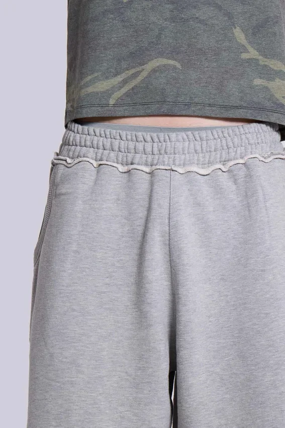 Grau melierte „Monster Joggers“ Baggy-Shorts