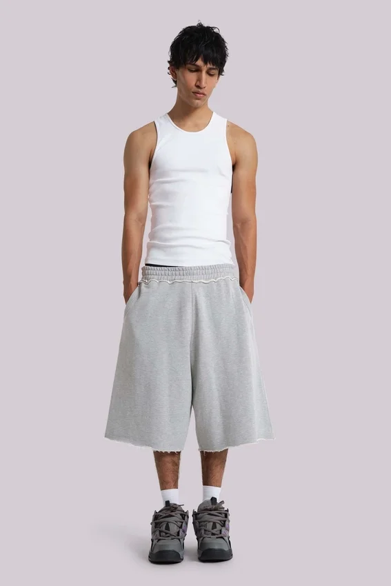 Grau melierte „Monster Joggers“ Baggy-Shorts