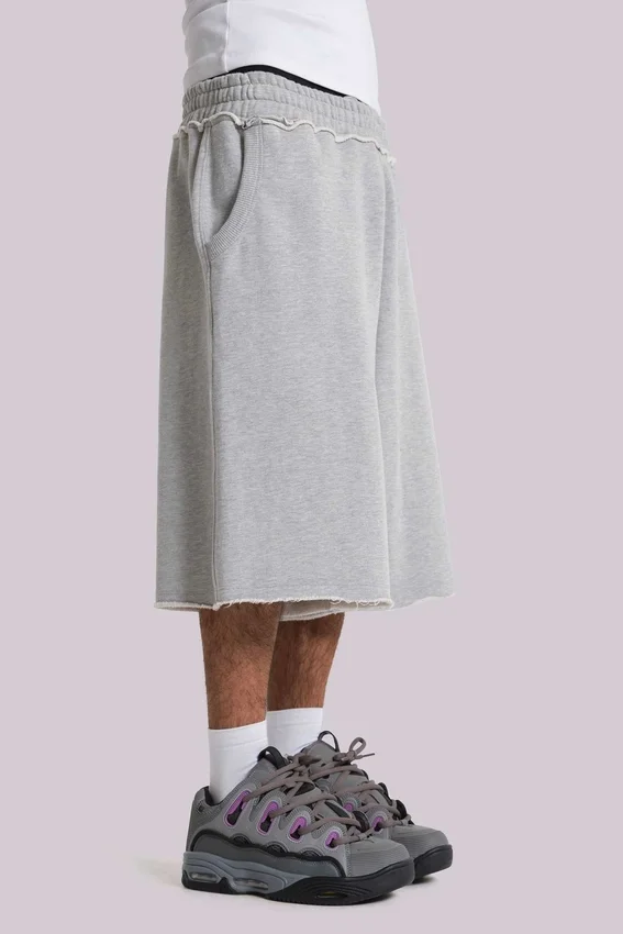 Grau melierte „Monster Joggers“ Baggy-Shorts