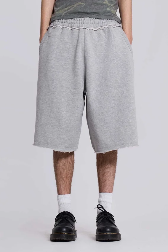 Grau melierte „Monster Joggers“ Baggy-Shorts