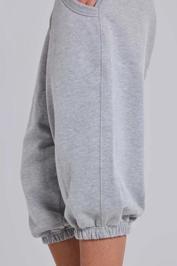 Grau melierte, verkürzte „Monster Joggers“
