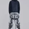 Grau melierte, weite Monster Joggers mit Gothic-Print