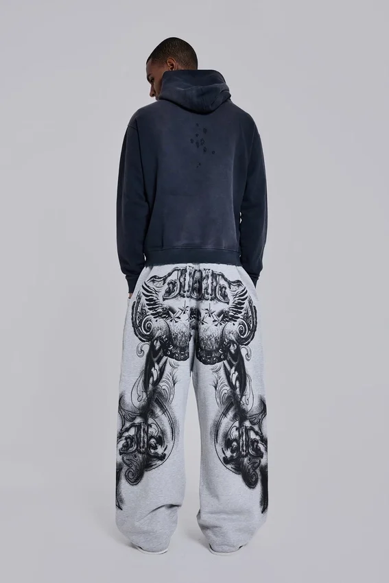 Grau melierte, weite Monster Joggers mit Gothic-Print