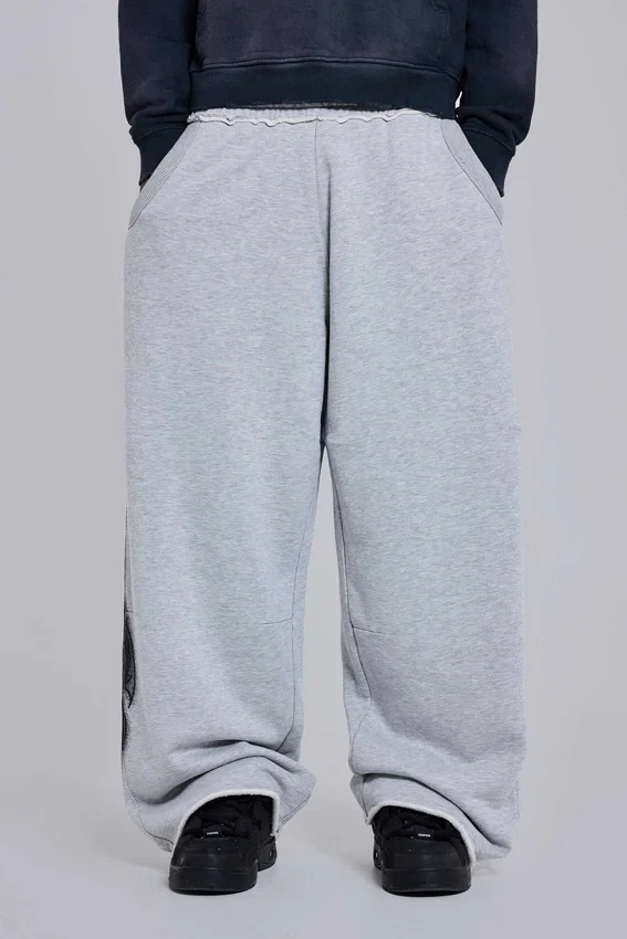 Grau melierte, weite Monster Joggers mit Gothic-Print