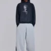 Grau melierte, weite Monster Joggers mit Gothic-Print