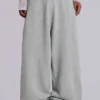 Graue, melierte, weite „Monster Joggers“