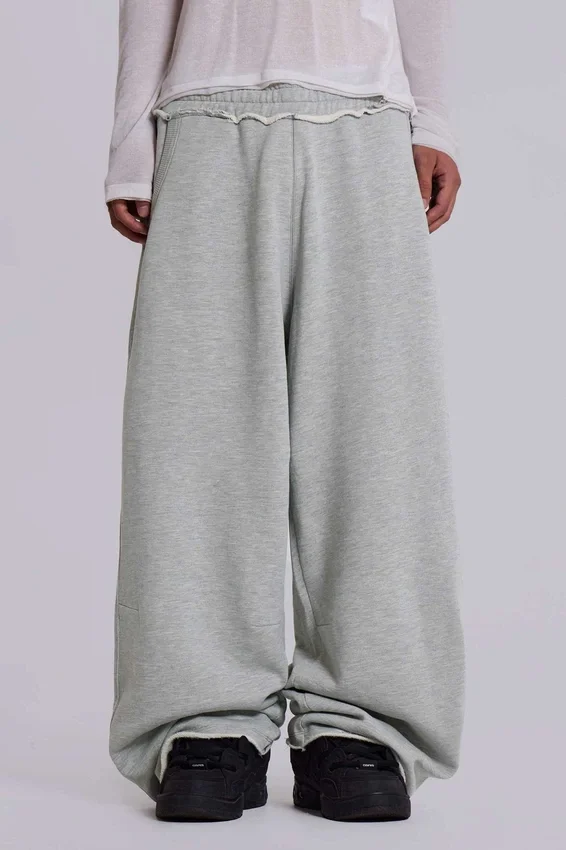 Graue, melierte, weite „Monster Joggers“