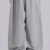 Graue, melierte, weite „Monster Joggers“