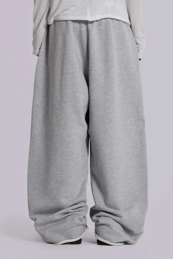 Graue, melierte, weite „Monster Joggers“