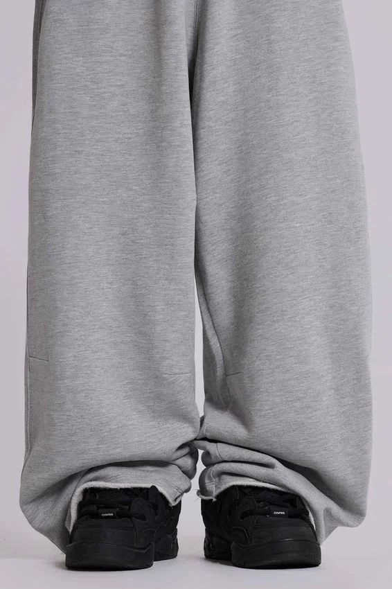 Graue, melierte, weite „Monster Joggers“