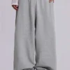 Graue, melierte, weite „Monster Joggers“
