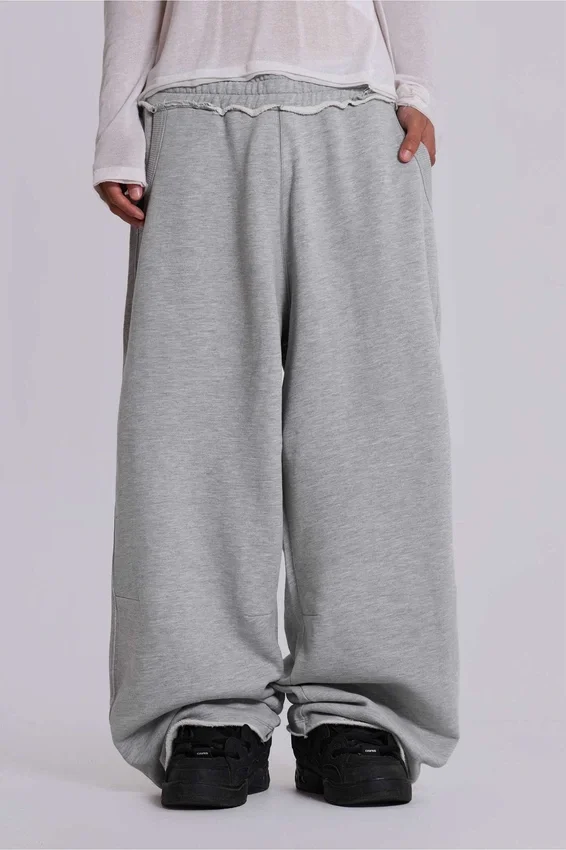 Graue, melierte, weite „Monster Joggers“