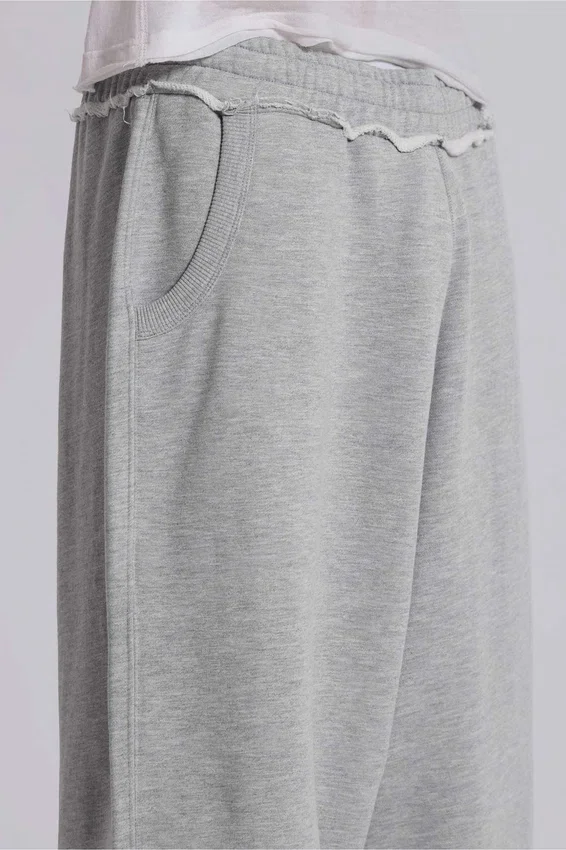 Graue, melierte, weite „Monster Joggers“
