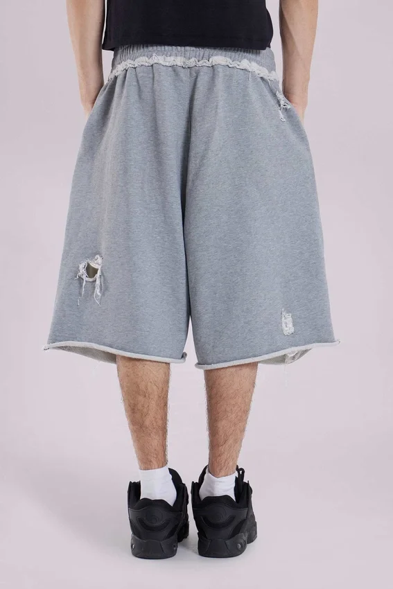 Graue Monster-Shorts im Distressed-Look