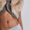 Meka-Strickbolero aus Kunstfell