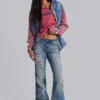 Mittelblaue, im Used-Look verarbeitete, geknitterte Drift-Flared-Jeans