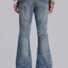 Mittelblaue, im Used-Look verarbeitete, geknitterte Drift-Flared-Jeans