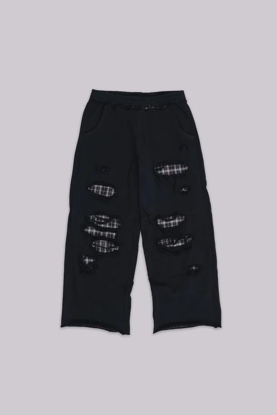 Monster Joggers mit Karomuster und Lagenlook