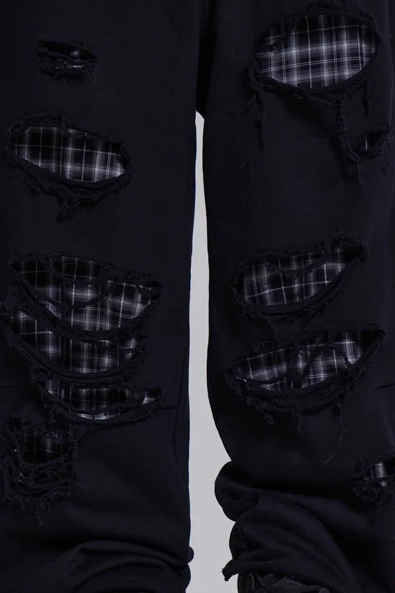 Monster Joggers mit Karomuster und Lagenlook