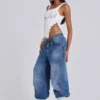 „Nailed Studded Colossus Jeans“ in mittelblauer Waschung