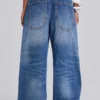 „Nailed Studded Colossus Jeans“ in mittelblauer Waschung