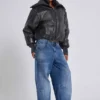 „Nailed Studded Colossus Jeans“ in mittelblauer Waschung