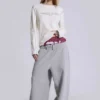Off-White-T-Shirt mit Tattoo-Applikation