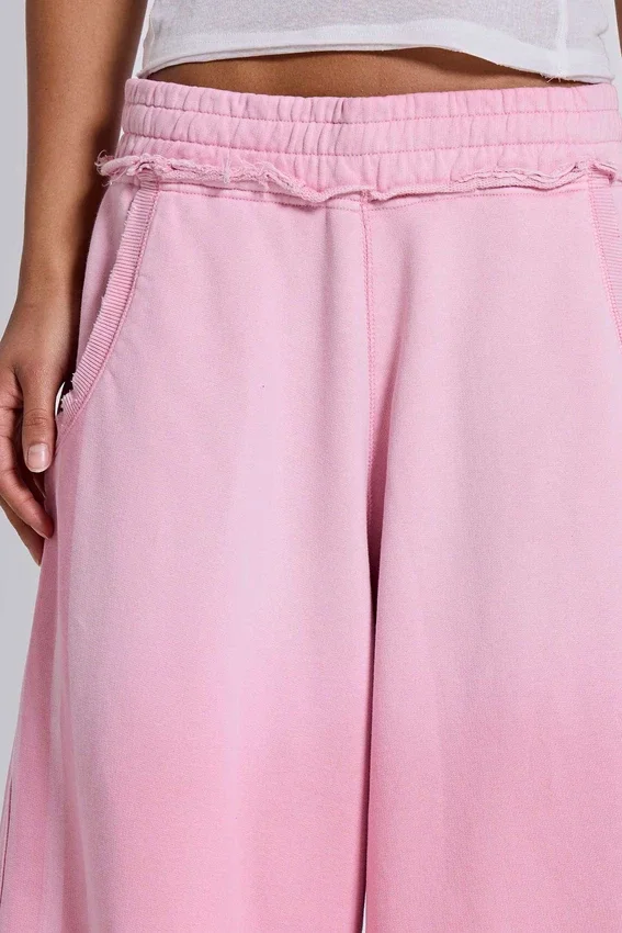 Rosa sportliche, weite „Monster Joggers“-Jogginghose