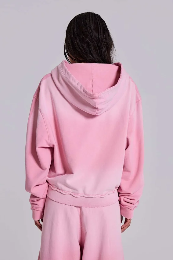 Rosa sportlicher, weit geschnittener „Monster“-Hoodie