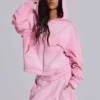Rosa sportlicher, weit geschnittener „Monster“-Hoodie