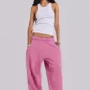 Rosa, weite Monster Joggers mit Umschlag